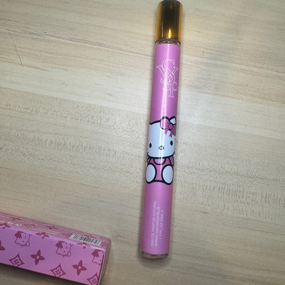 Hello Kitty Pink Perfume with Gold Cap